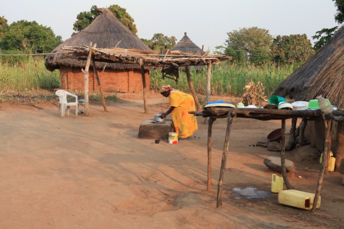Grass hut, clay stove, home compound, South Sudan Village