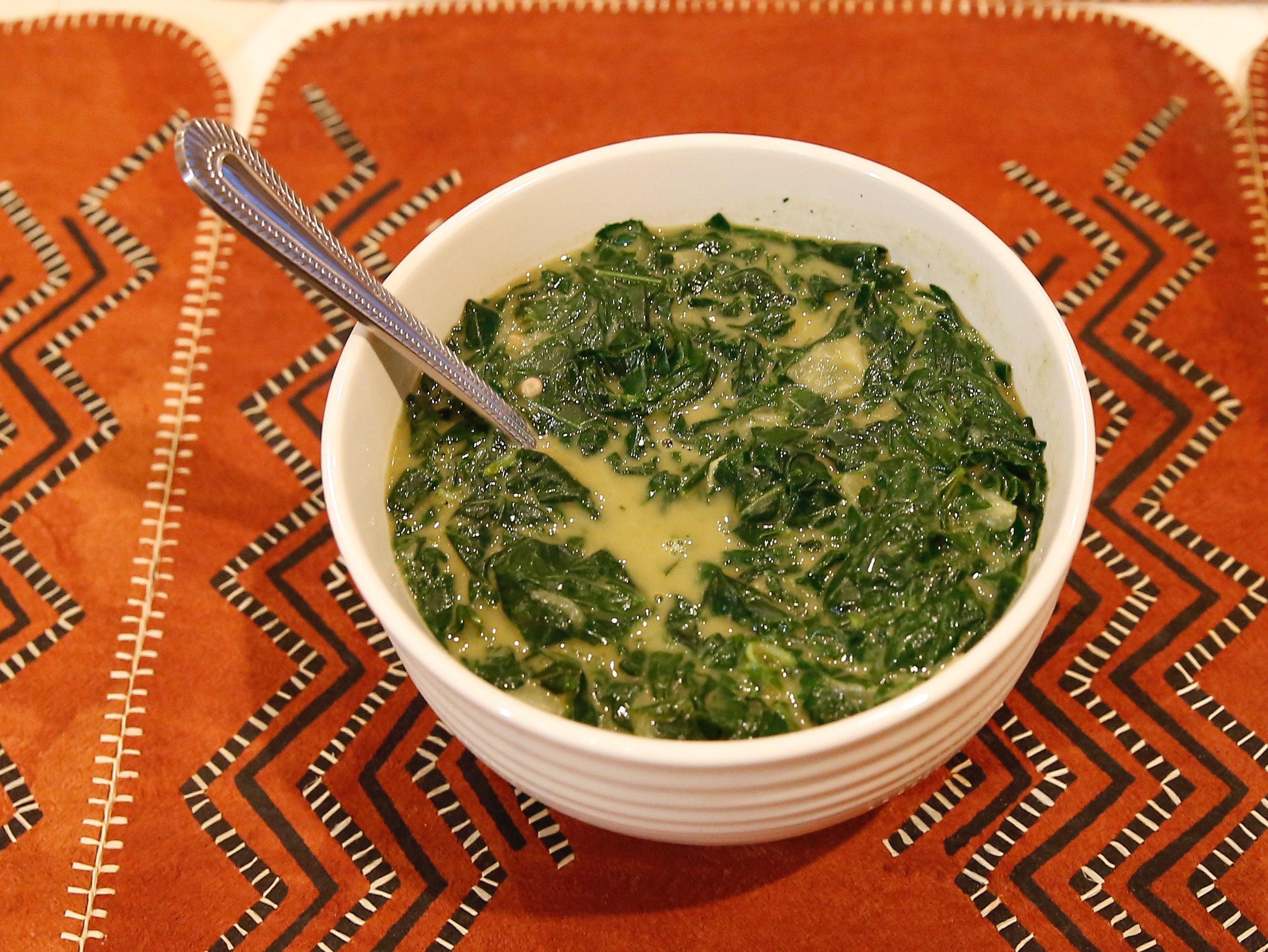 Nyete greens with peanut butter, in a bowl