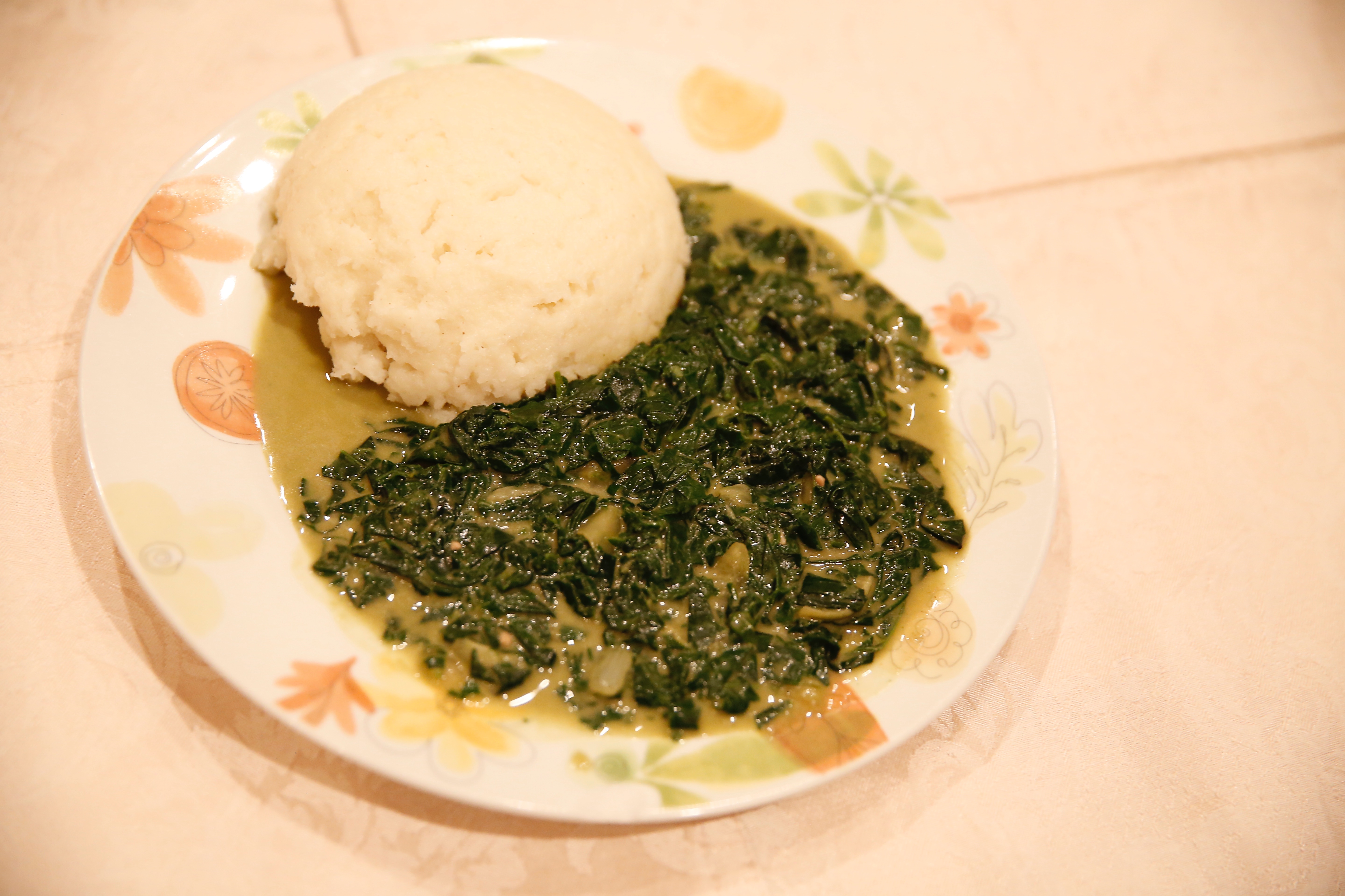 Nyete with peanut butter, served with Asida