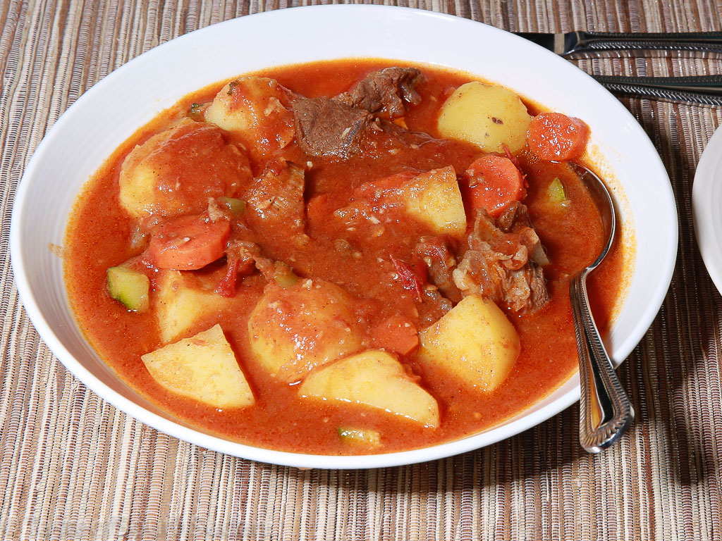 Pictured above is a dish of lamb stew with potatoes and carrots.